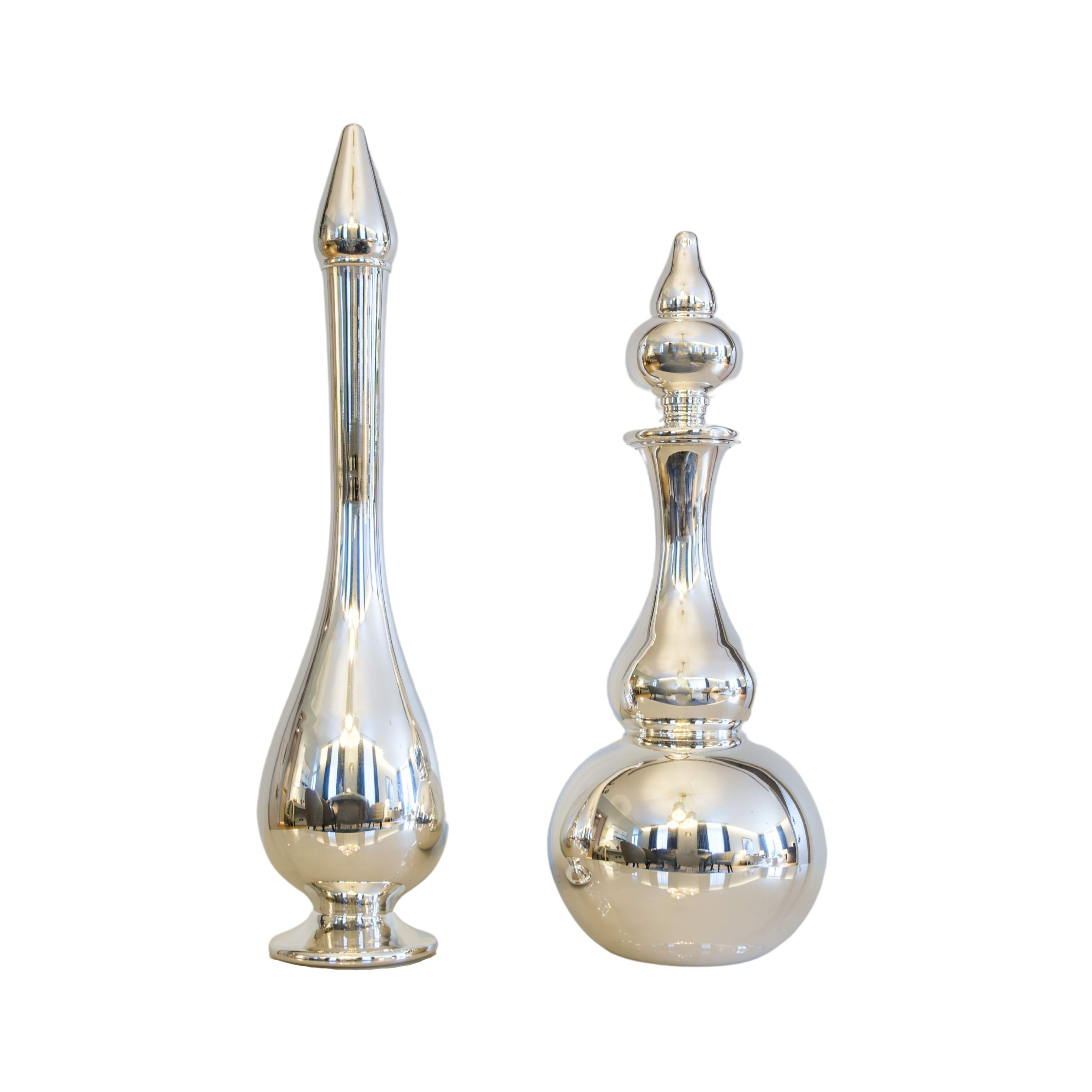 Set of two decorative bottles in silver plated