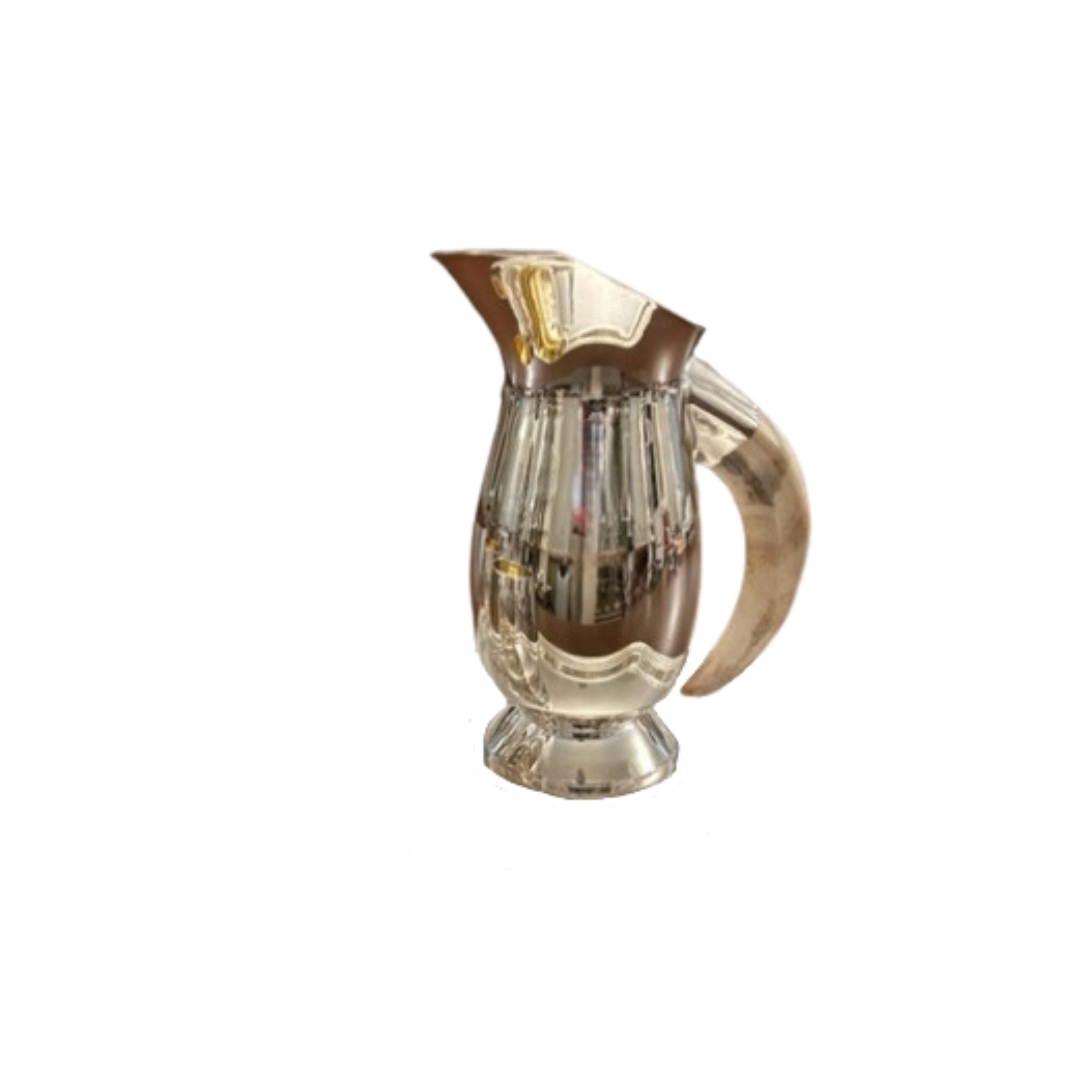 Silver plated pitcher with warthog tusk handle